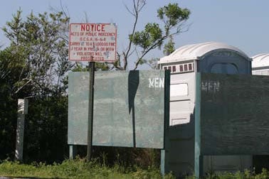 This is exactly how NOT to do CPTED! 1. It is dreadfully ugly; 2. the walls around the portable bathroom make it impossible to observe undesirable and unwanted behaviors. Credit: Ronald Clarke